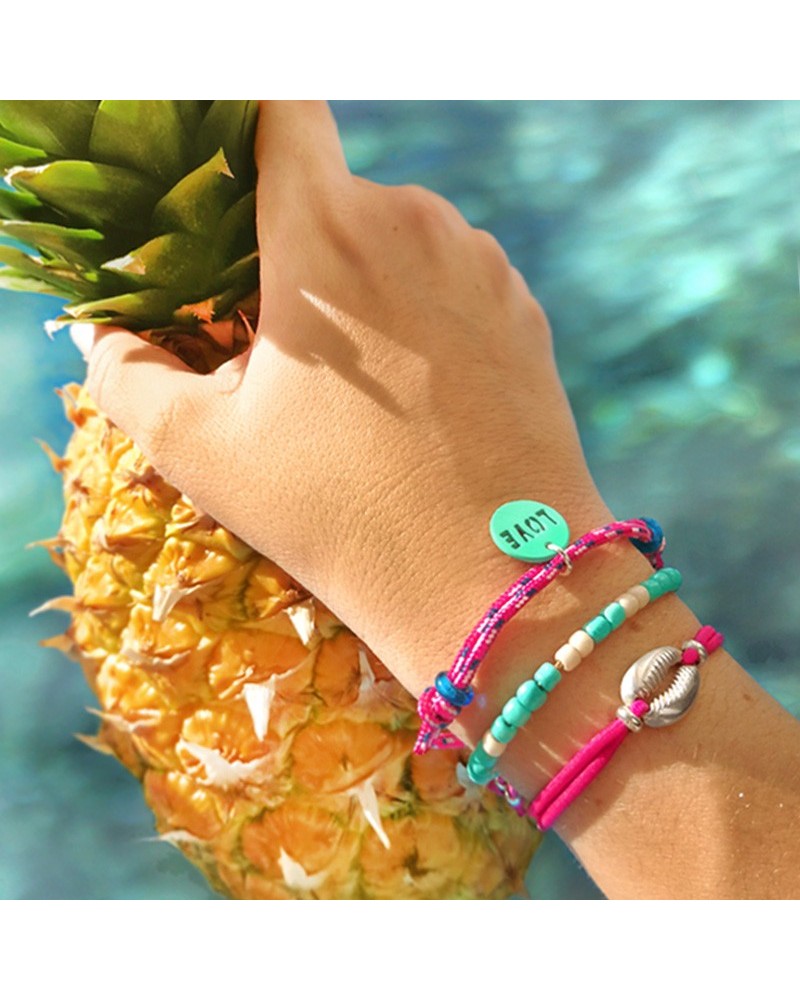 Pulseras fucsia y turquesa